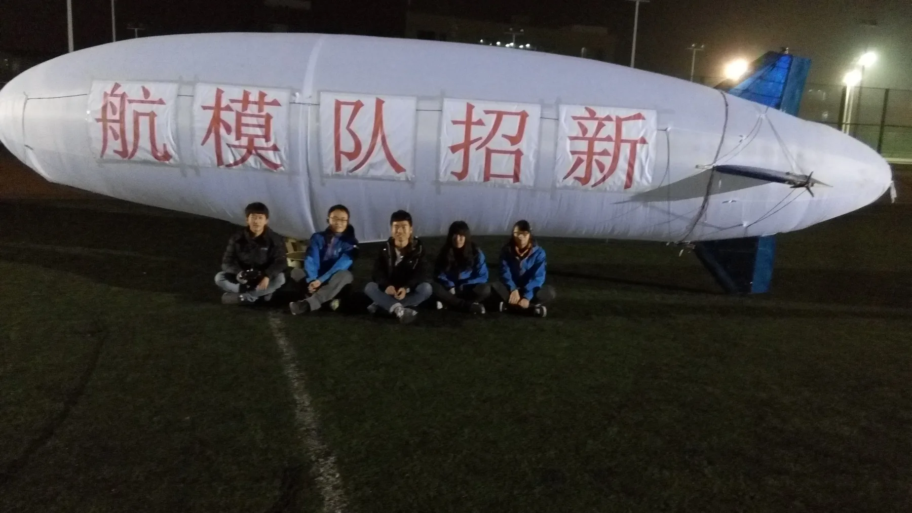 The student team standing with the full-scale tilting-propulsion airship
