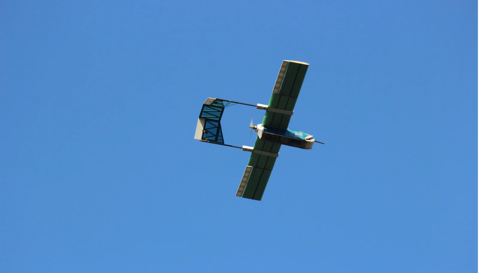 Underside view of the foldable reconnaissance aircraft in flight