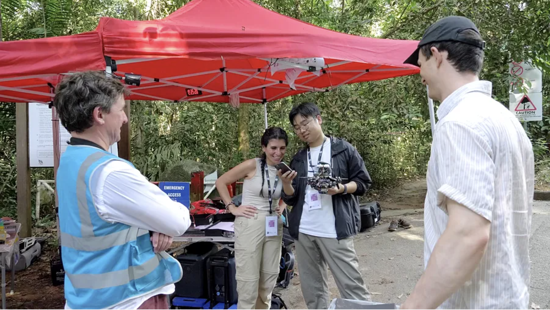 Liming Zheng testing a branch-perching drone with the ETHBiodivX team in the rainforest
